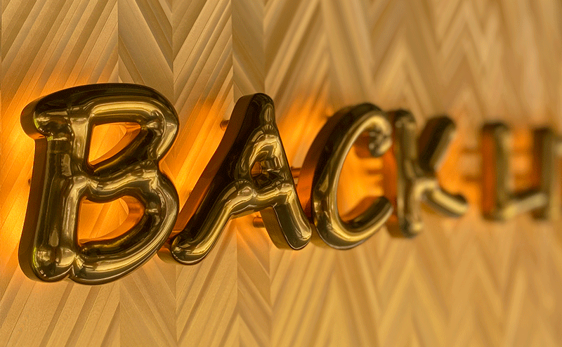 「back」という文字のバックチャンネルのサイン